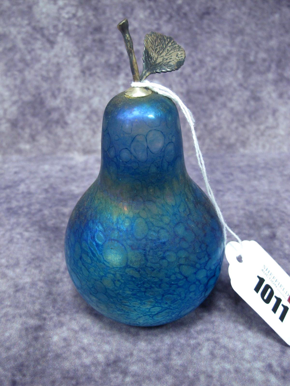 A Glasform by John Ditchfield Glass Paperweight in the Form of a Pear, in iridescent blue/purple