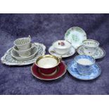 A Collection of Rockingham Tea Wares, to include; a trio and matching plate, painted with a