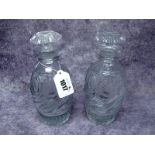A Pair of Georgian Glass Decanters and Mushroom Stoppers, the ovoid bodies with oval hobnail cut