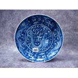 A Chinese Porcelain Saucer Dish, painted in blue with dragons chasing a flaming peal, six