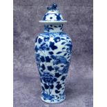 A Late XIX Century Chinese Porcelain Baluster Vase and Cover, with dog of fo finial, painted in blue