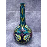 A Hancock & Sons 'Morris Ware' Pottery Bottle Vase, painted in deep shades of purple, turquoise