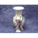 A Moorcroft Pottery Baluster Form Vase, designed by Emma Bossons in the 'Frangipani' pattern against