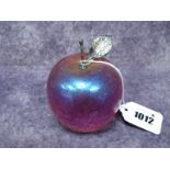 A Glasform by John Ditchfield Glass Paperweight in the Form of an Apple, in iridescent pink, with
