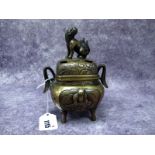 A Late XIX Century Japanese Bronze Two Handled Koro and Pierced Cover, of footed rectangular form,