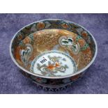 A Late XIX Century Japanese Imari Pattern Pottery Bowl, of circular form with outcurved neck,