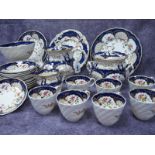 A Rockingham Porcelain Coffee and Tea Service, moulded basketweave decoration and painted with