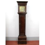 An XVIII Century Pine Longcase Clock, the hood with stepped cornice and twin columns, the brass dial