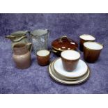 A Collection of Rockingham Pottery Treacle Glazed and Gilt Teawares, red griffin marks,