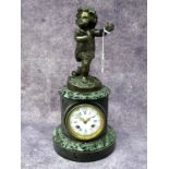 A Late XIX Century French Bronze and Marble Mantel Clock, surmounted by a cherub above a fluted