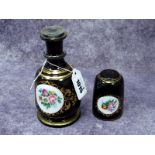 A Bohemian Late XIX Century Decanter and Matching Tumbler, the dark blue grounds each with white