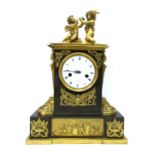 A Late XIX Century French Ormolu and Bronze Mantel Clock, the plinth applied with phoenix drinking