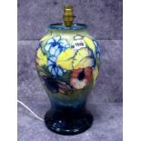 A Moorcroft Pottery Vase, (converted to a lamp) of baluster form, painted in the Orchid pattern