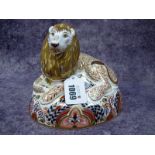 A Royal Crown Derby Porcelain Paperweight 'Lion', silver stopper, printed mark, date code for