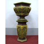 A Late XIX Century Heavy Stoneware Jardiniére on Stand, of hexagonal form decorated in the
