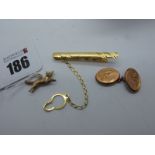 A Modern Tie Slide, stamped "750" (3grams); a 9ct gold cufflink (odd) and a novelty 9ct gold fox