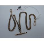 A 9ct Rose Gold Curb Link Double Albert Chain, to double swivel style clasps, suspending a T-bar,
