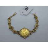 A 9ct Gold Fancy Link Bracelet, to swivel clasp, loose set with a half sovereign (1982) (overall