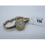 Harrinson Liverpool; A Vintage 9ct Gold Cased Ladies Wristwatch, the signed dial with black and