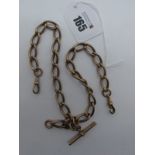 An Elongated Curb Link Double Albert Chain, (some links stamped "9ct") to double swivel style clasps