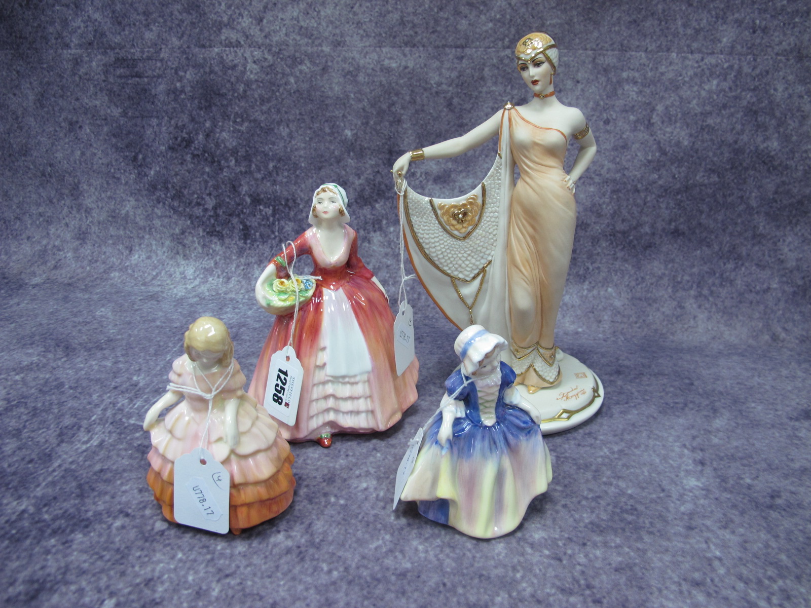 Three Royal Doulton Figurines, Dinky Do HN1678, Janet HN 1537, Rose HN1368 and Capodimonte figure "