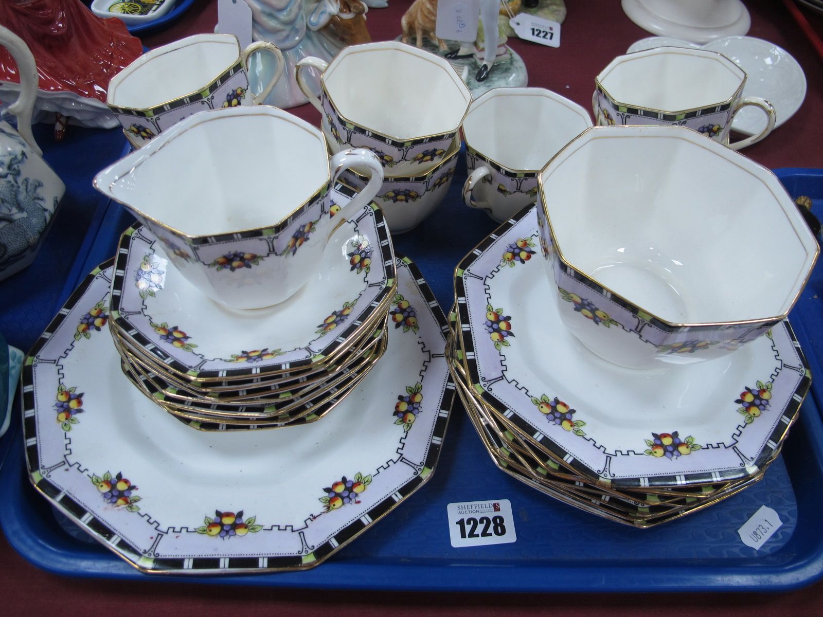 An Early XX Century "Delphine" Tea Service,of twenty four pieces, cups, saucers, cake plate, etc:-