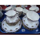 An Early XX Century "Delphine" Tea Service,of twenty four pieces, cups, saucers, cake plate, etc:-
