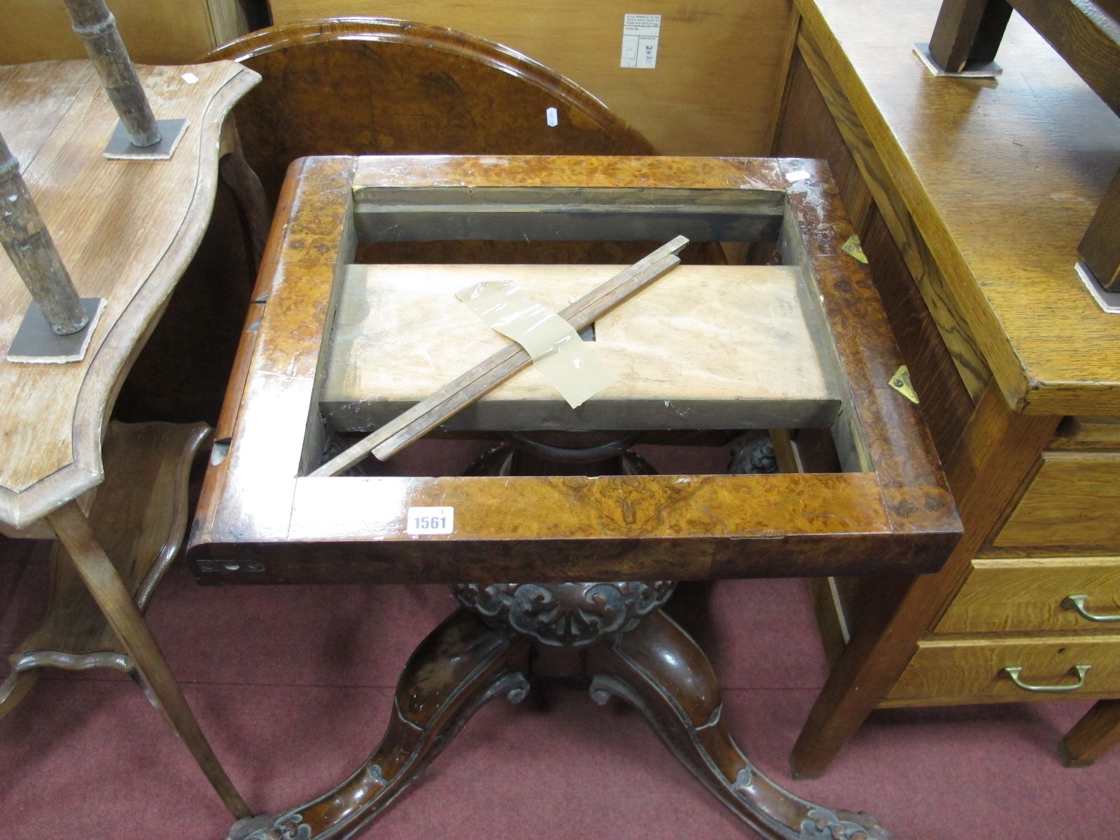 A XIX Century Walnut Demi Lune Pedestal Table, turned pedestal on cabriole legs, scroll feet.