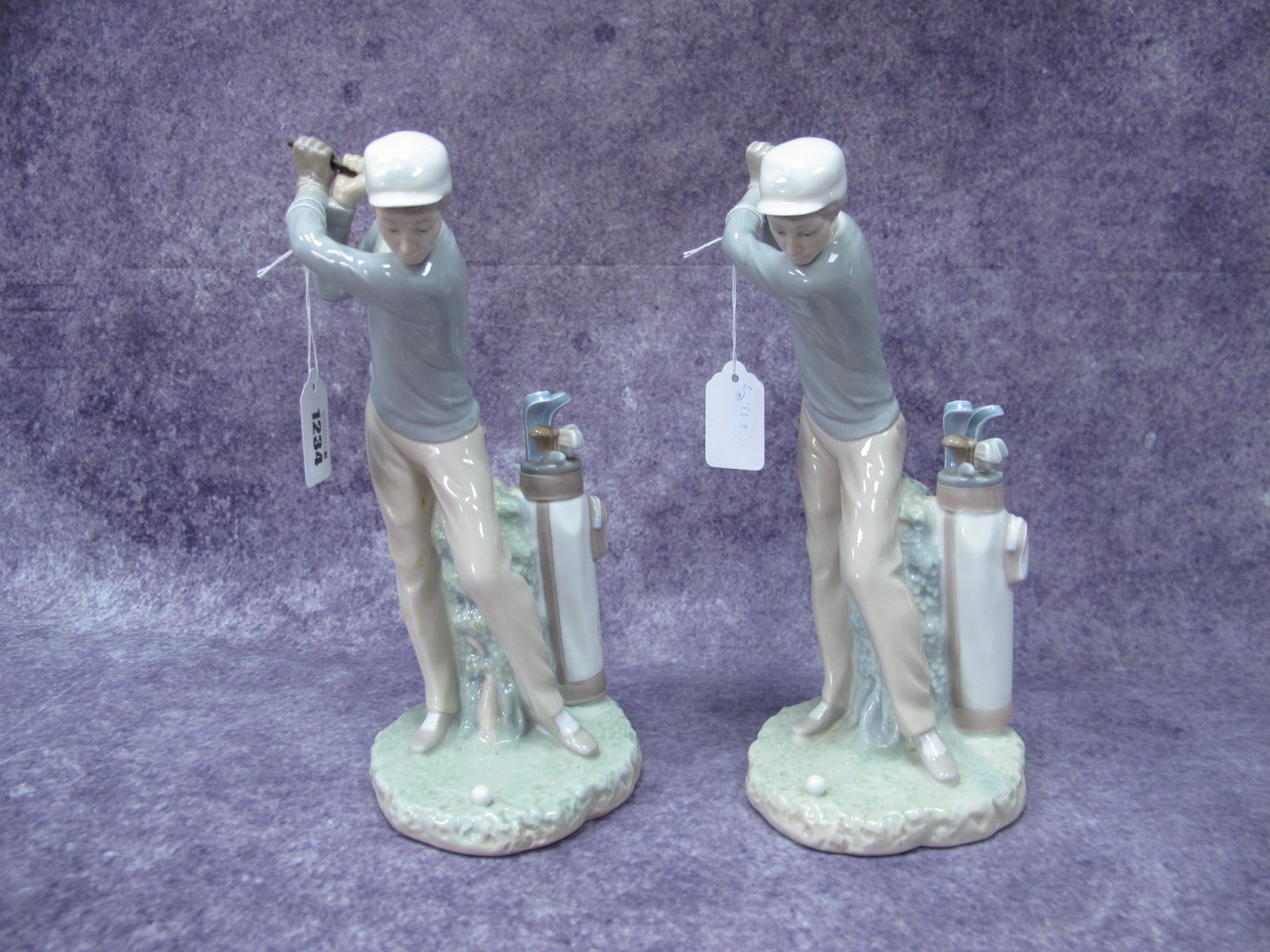 Lladro Pottery Golfer, lacking clubs, 27cm high.