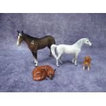 A Beswick Brown Horse, 20cm high. Grey mottled horse, boxer dog, 1017 curled fox.
