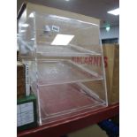 A Perspex Table Top Display Cabinet with three sloping inner shelves, 36.5cm wide.