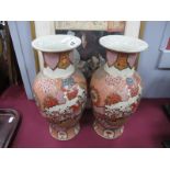 A Pair of Japanese Vases, decorated with figures and floral decoration, 31cm high.