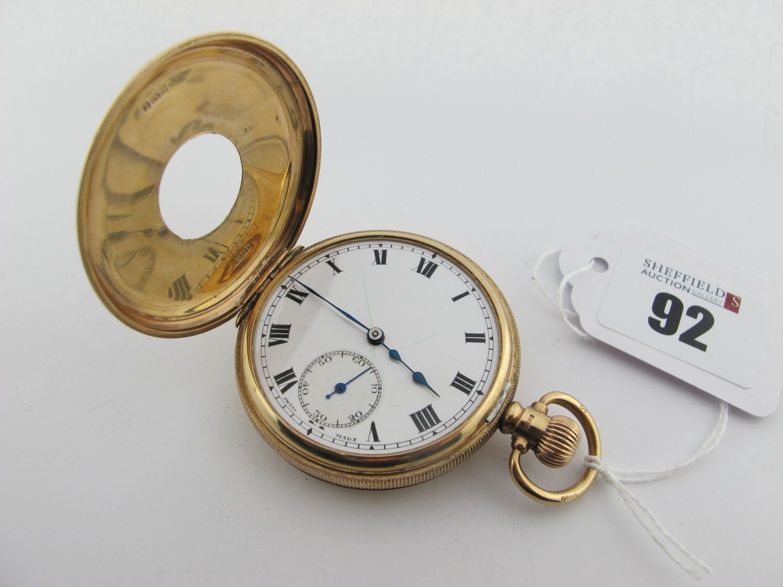 A 9ct Gold Cased Half Hunter Pocketwatch, the white dial (plastic glass loose) with black Roman