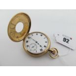 A 9ct Gold Cased Half Hunter Pocketwatch, the white dial (plastic glass loose) with black Roman