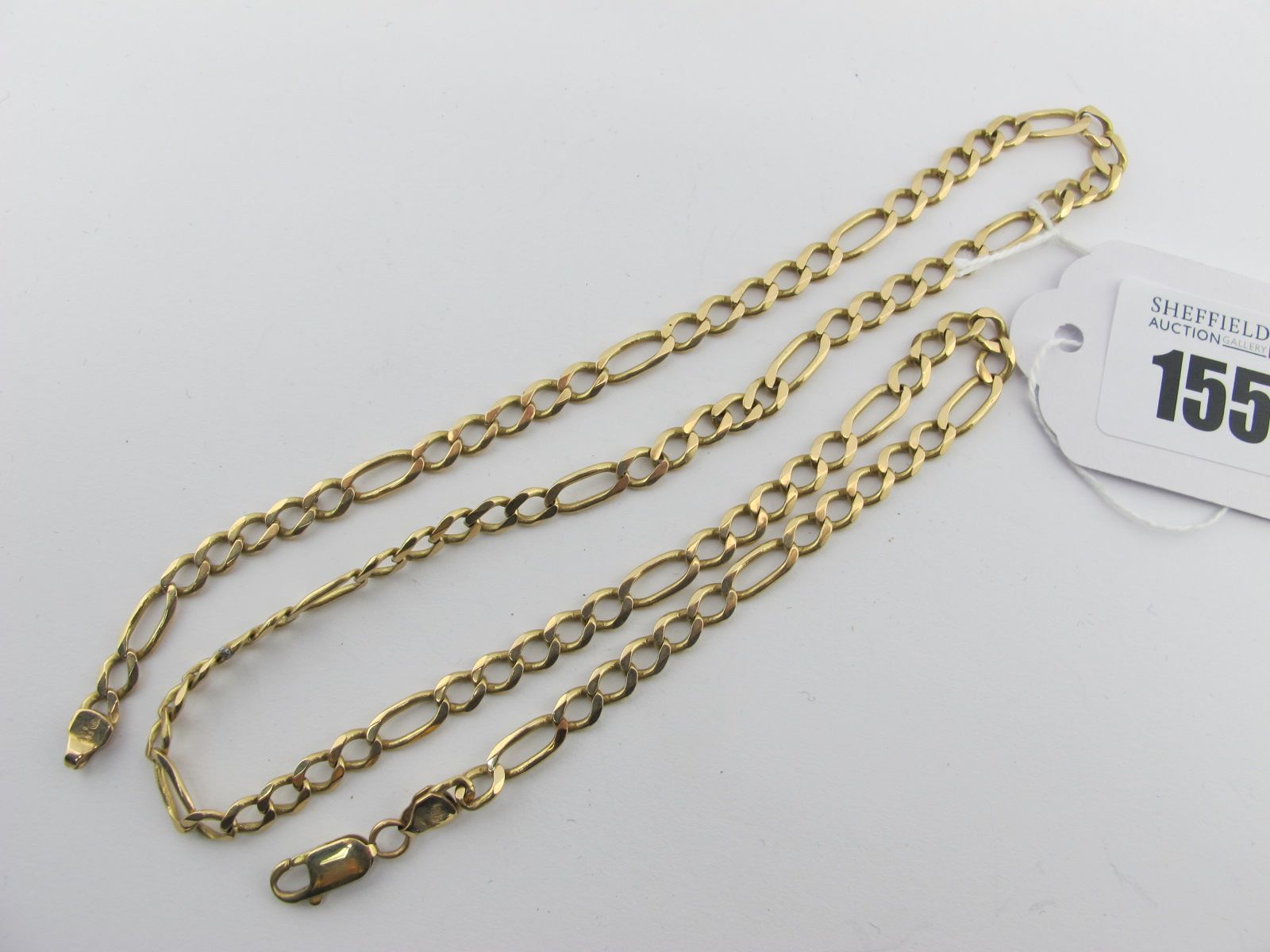 A Curb Link Chain, stamped "585", 58.5cm long (20grams).