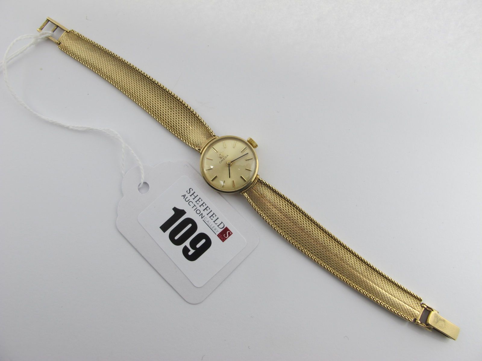 Omega; A 9ct Gold Cased Ladies Wristwatch, the signed dial with line markers, the movement
