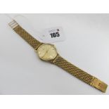 Longines; A 9ct Gold Cased Gent's Wristwatch, the signed dial with line markers and centre