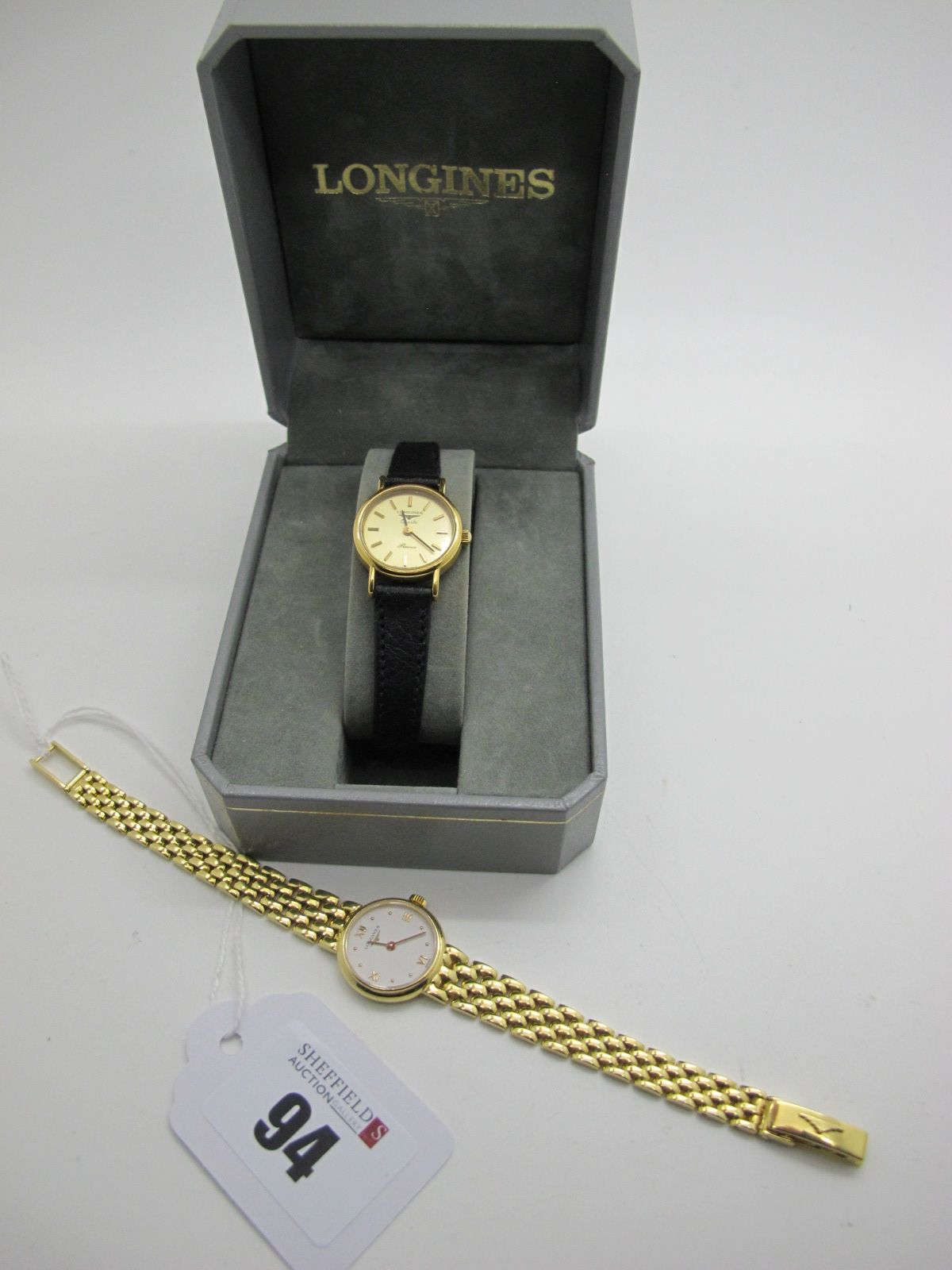 Longines; A Modern Ladies Wristwatch, the signed dial with dot markers and Roman numerals, within