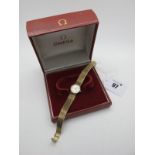 Omega; A 9ct Gold Cased Ladies Wristwatch, the signed dial with line markers, the movement