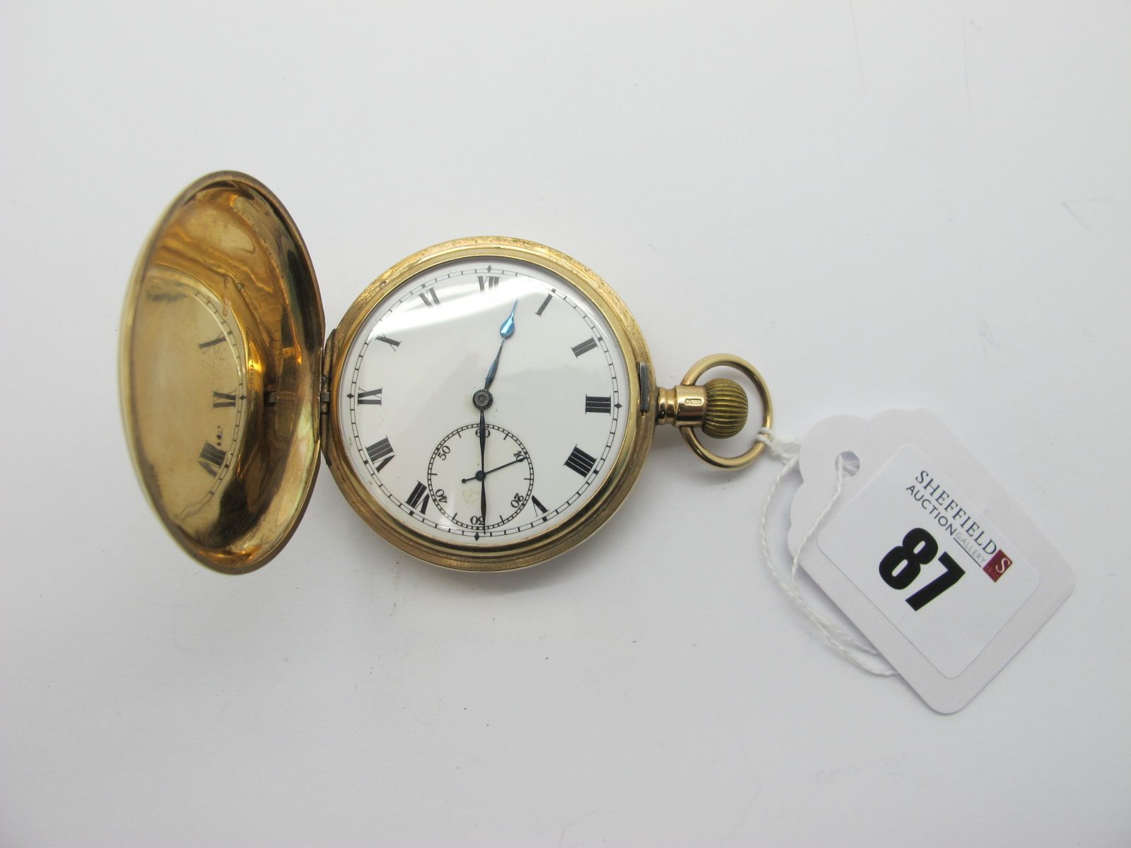 A 9ct Gold Cased Hunter Pocketwatch, the white dial with black Roman numerals and seconds subsidiary