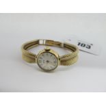 A 9ct Gold Cased Ladies Wristwatch, the Vertex signed dial with line markers and Arabic numerals, to