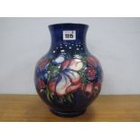 A Moorcroft Pottery Vase, of globular form with short flared neck, painted in the 'Anemone'