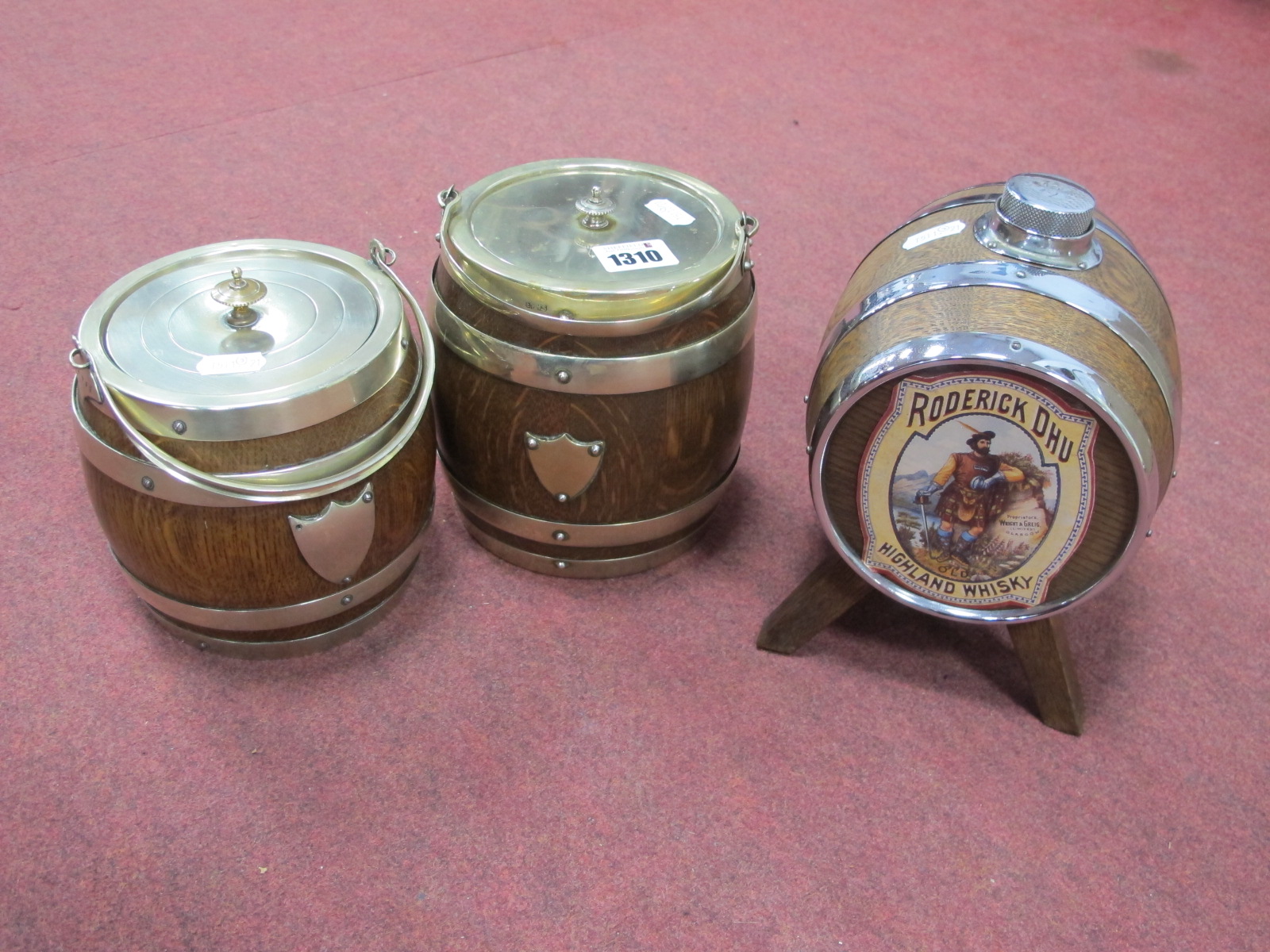 A Pair of Banded Edwardian Biscuit Barrels, plus a whisky barrel on stand with tap and drain pot.