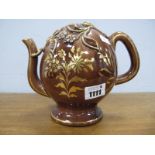 A Brameld Cadogan Brown Glazed Pottery Teapot, decorated in gilt with flowers and foliage, unmarked,