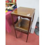 An Early XX Century Oak Jug and Bowl Stand, with a single drawer, on chamfered supports, 81cm high.