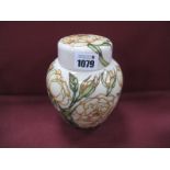 A Moorcroft Pottery Ginger Jar, painted in the trial 'Madame Rose' design, shape 769/6, dated 25.7.