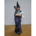 A Royal Doulton Figure, The Wizard, HN 2877, green printed mark, 25cm high.