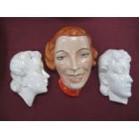 A Czechoslovakian Art Deco Style Hand Painted Wall Mask, marked 73974 and two further wall masks A41