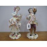 A Pair of Late XIX Century German Porcelain Figurines, each in XVIII Century floral decorated lace