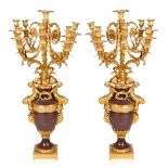 A PAIR OF FRENCH EIGHT-LIGHT LOUIS XVI-STYLE GILT-BRONZE AND ROUGE GRIOTTE MARBLE CANDELABRA, AFTER